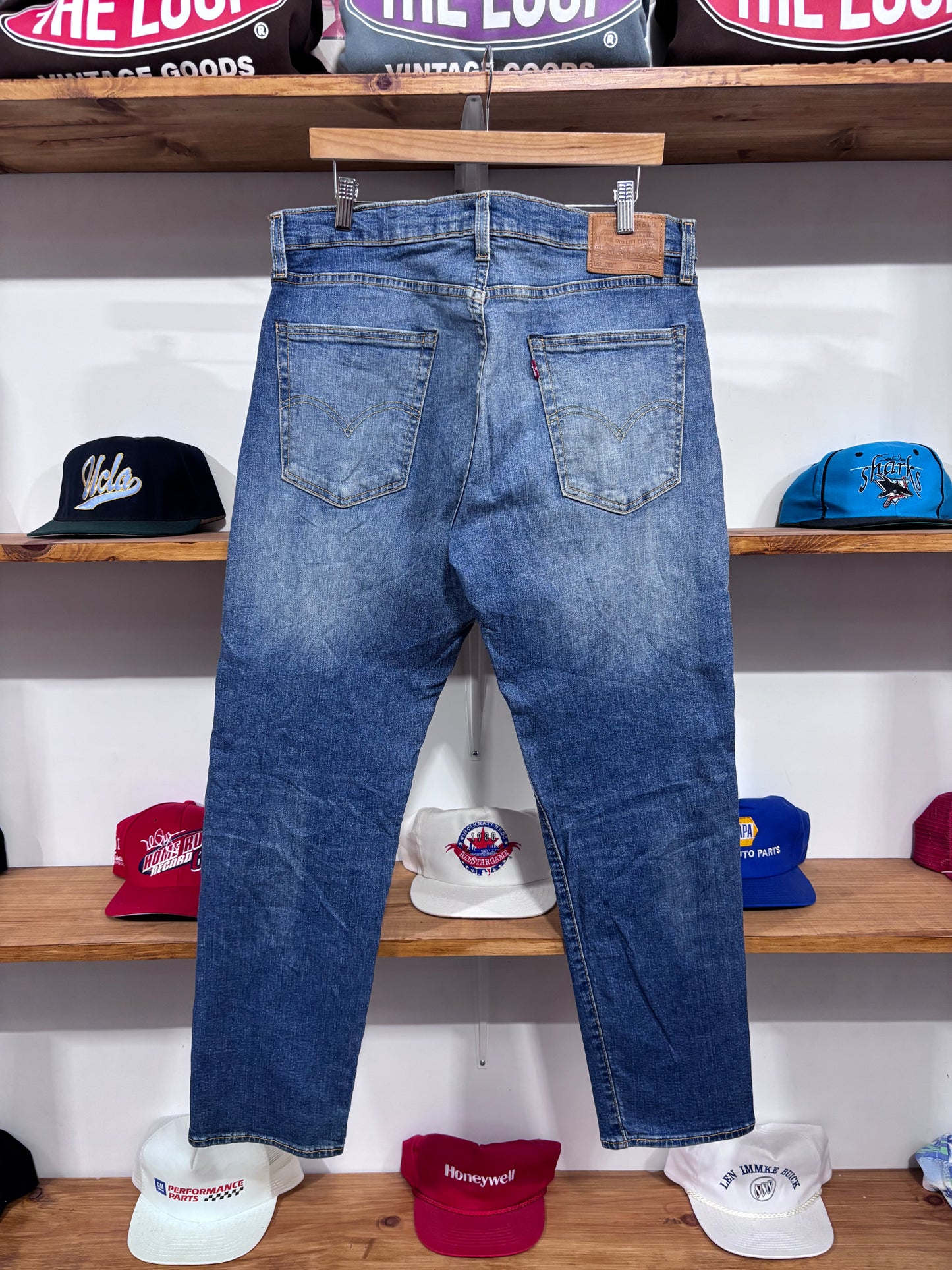 Vintage Levi’s 502 Faded Jeans